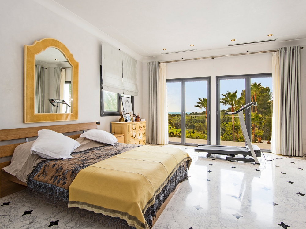 Bedroom suite with view of the golf course
