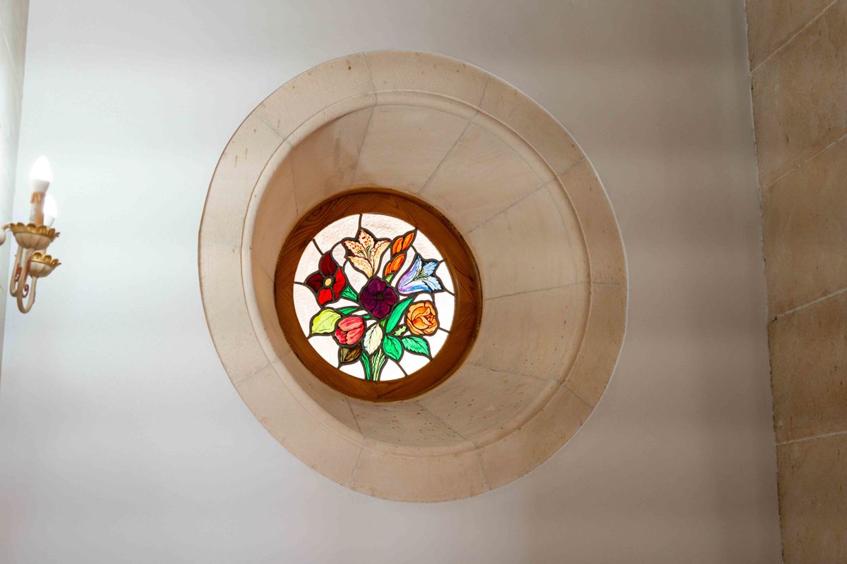 Rosette window in the staircase